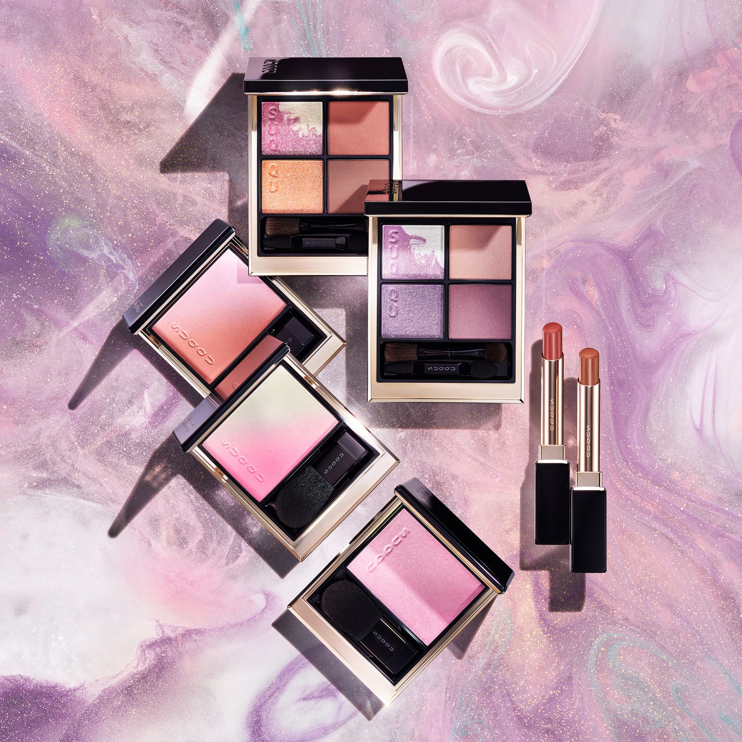 SUQQU Pre Summer Collection 2025 makeup products group on swirling background