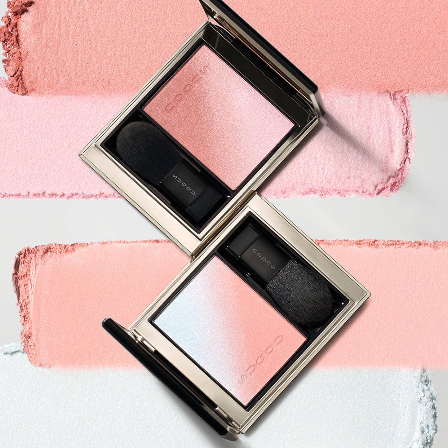 SUQQU Blurring Color Blush 07 and 08 blusher and highlighter palettes with colour texture background.