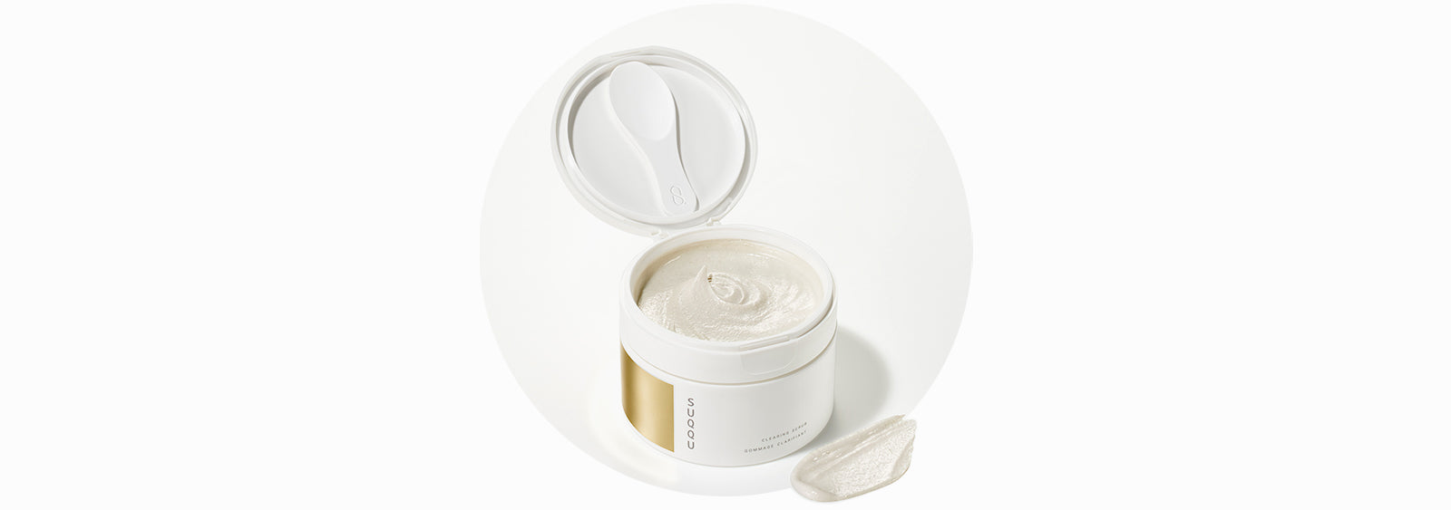 SUQQU Clearing Scrub face cleanser tub open with texture