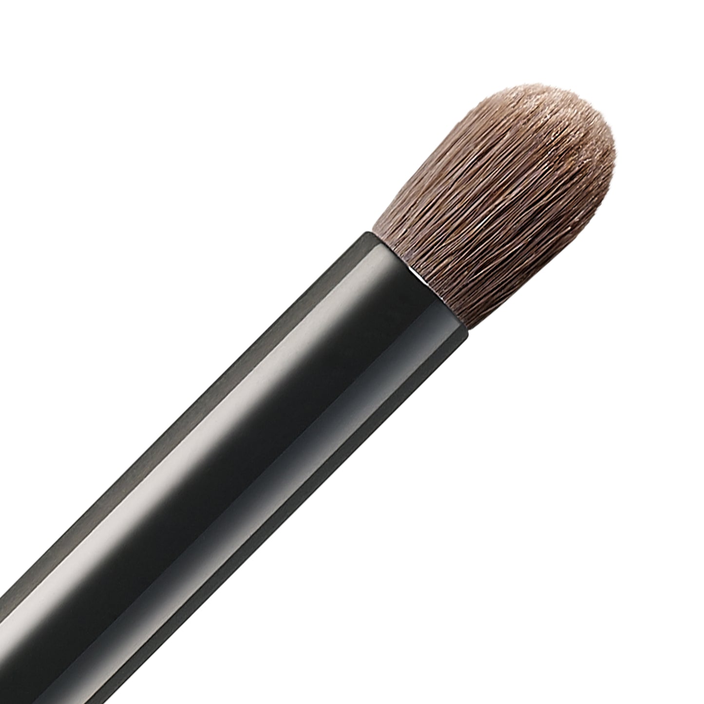 SUQQU Eyeshadow Brush R Japanese synthetic artisan professional grade make up brush bristle close up on plain background.