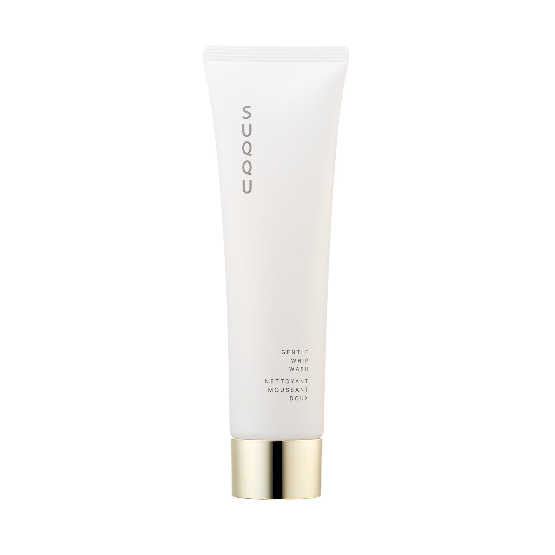 SUQQU Gentle Whip Wash foaming face cleansing skincare product tube on plain background.