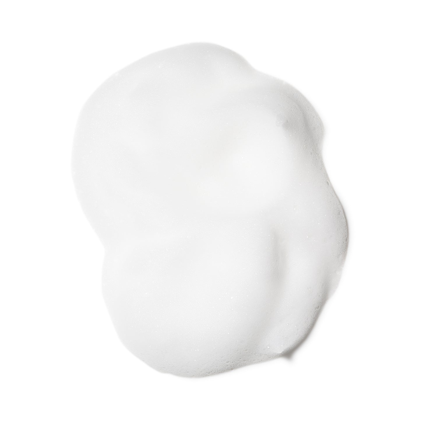 SUQQU Gentle Whip Wash luxury foam texture of face cleansing skincare product on plain background.