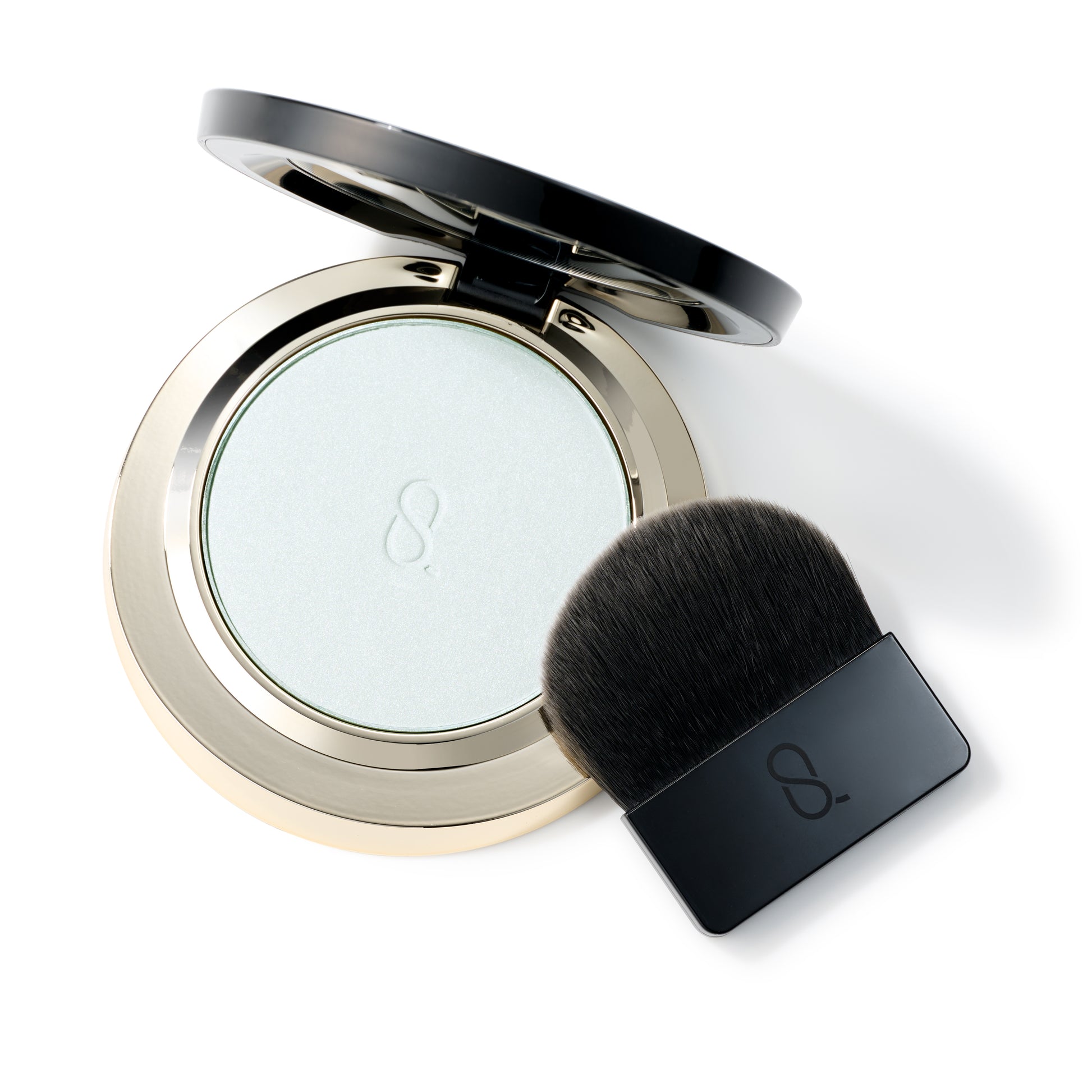 SUQQU Glow Setting Powder Compact open with brush