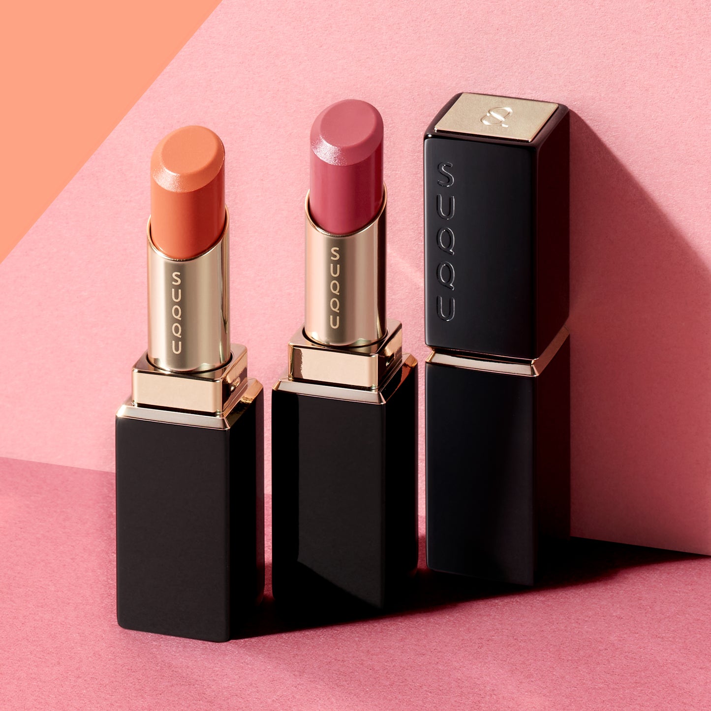 SUQQU Moisture Glaze Lipstick 107 and 108 on colourful background