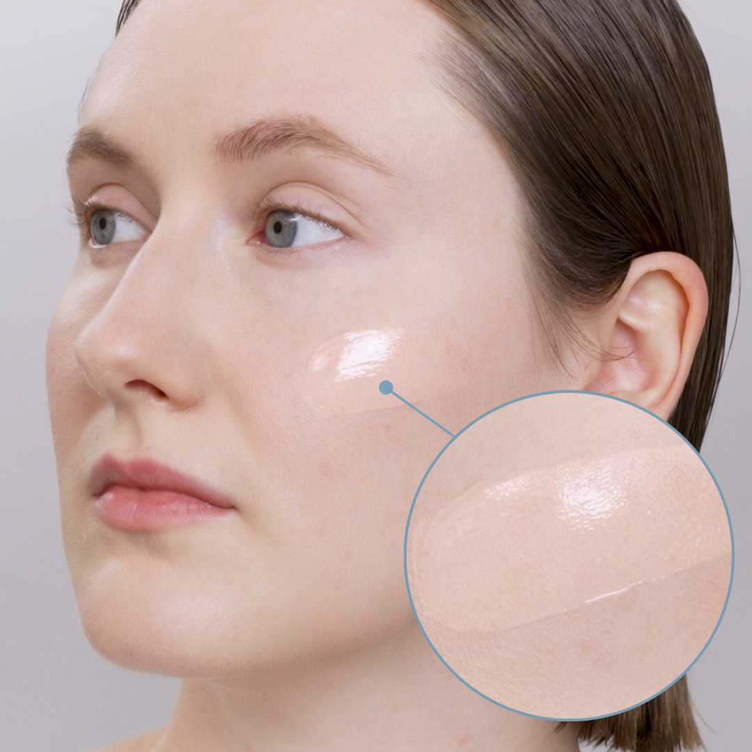 Models face showing SUQQU AQUFONS Water Tuning Gel skincare product swatch