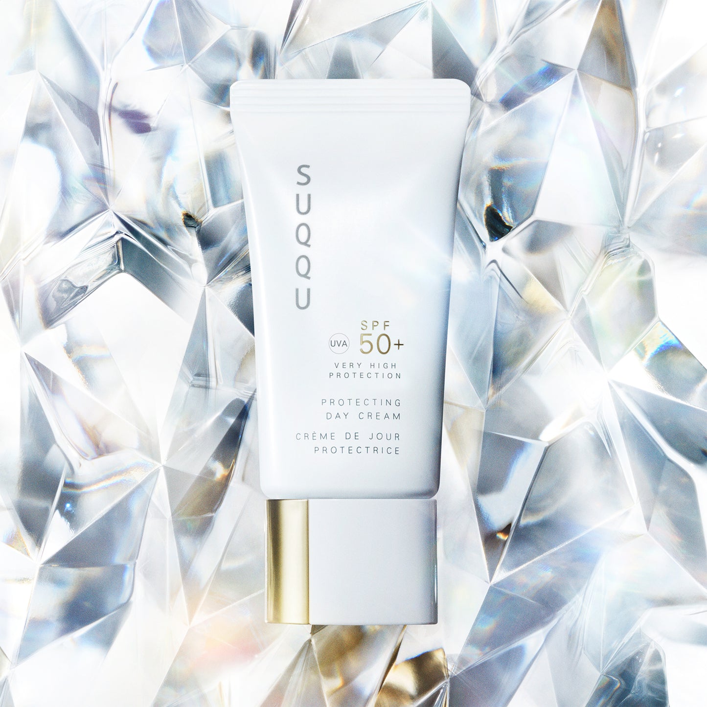SUQQU Protecting Day Cream Japanese luxury reliable sunscreen SPF 50+ moisturising face care base make up product on crystal background.