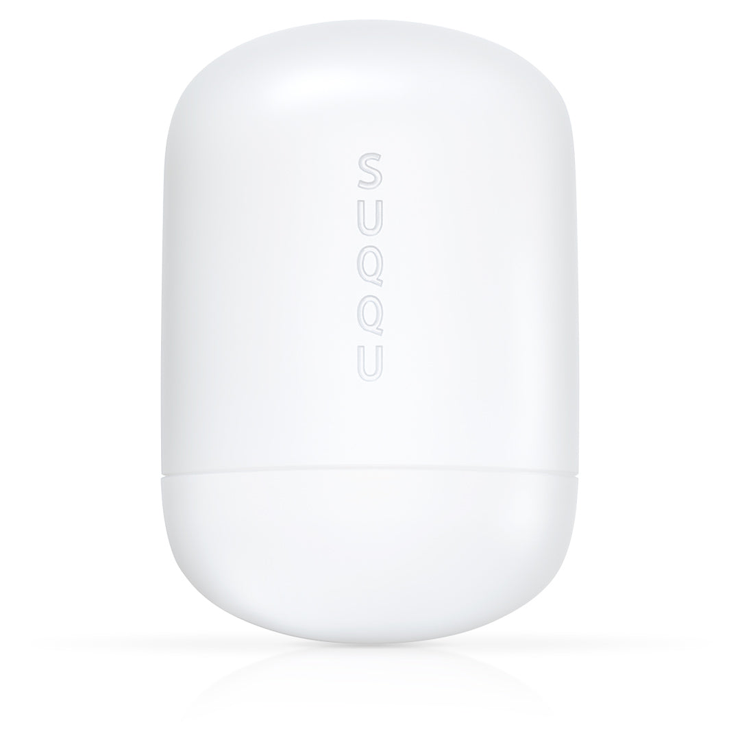 SUQQU Glowing Balm moisturising skincare balm stick product on a solid white background.