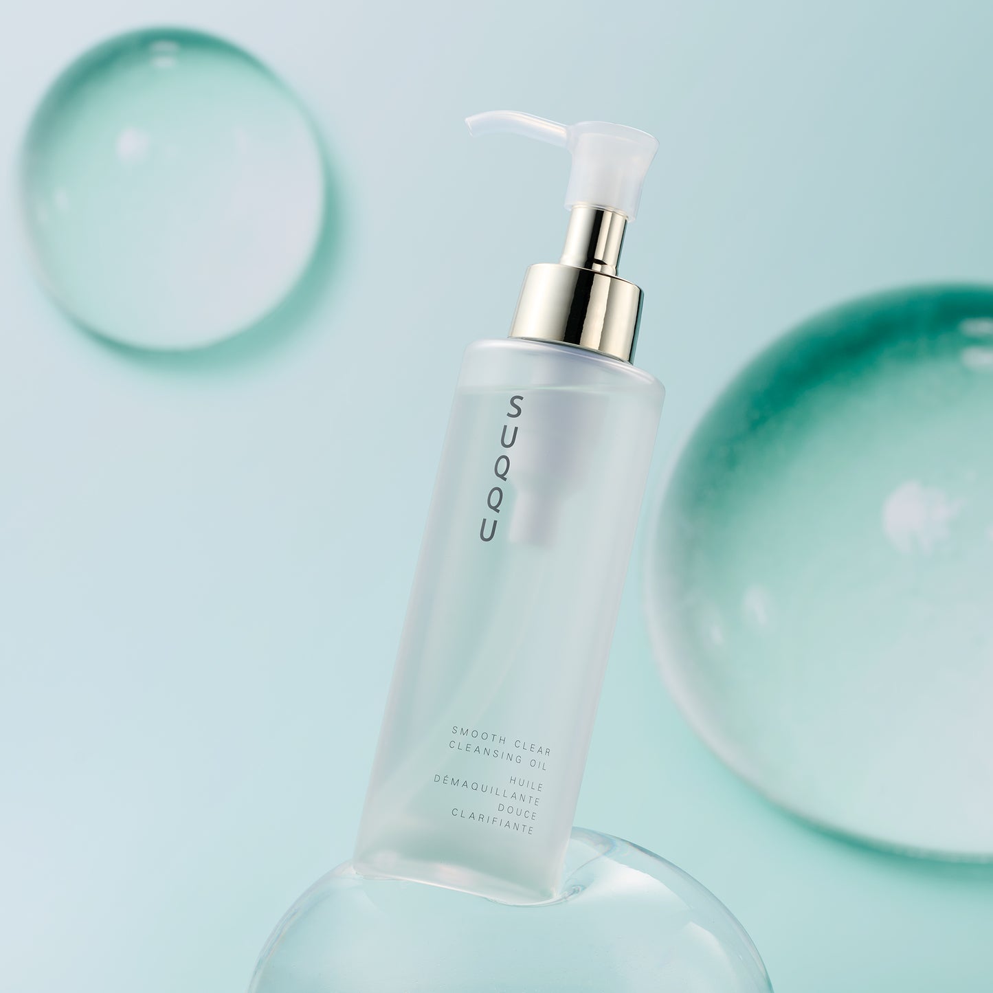 Smooth Clear Cleansing Oil product, pump bottle with liquid bubbles