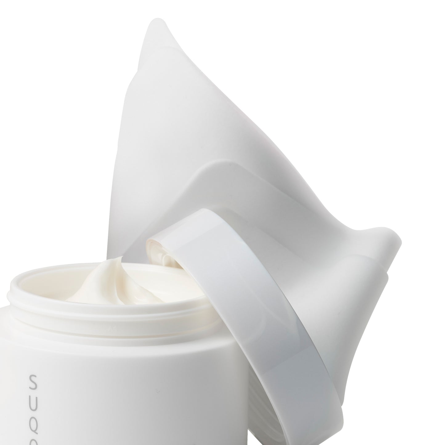 SUQQU Sponge Cloth product close up with open tube of cream