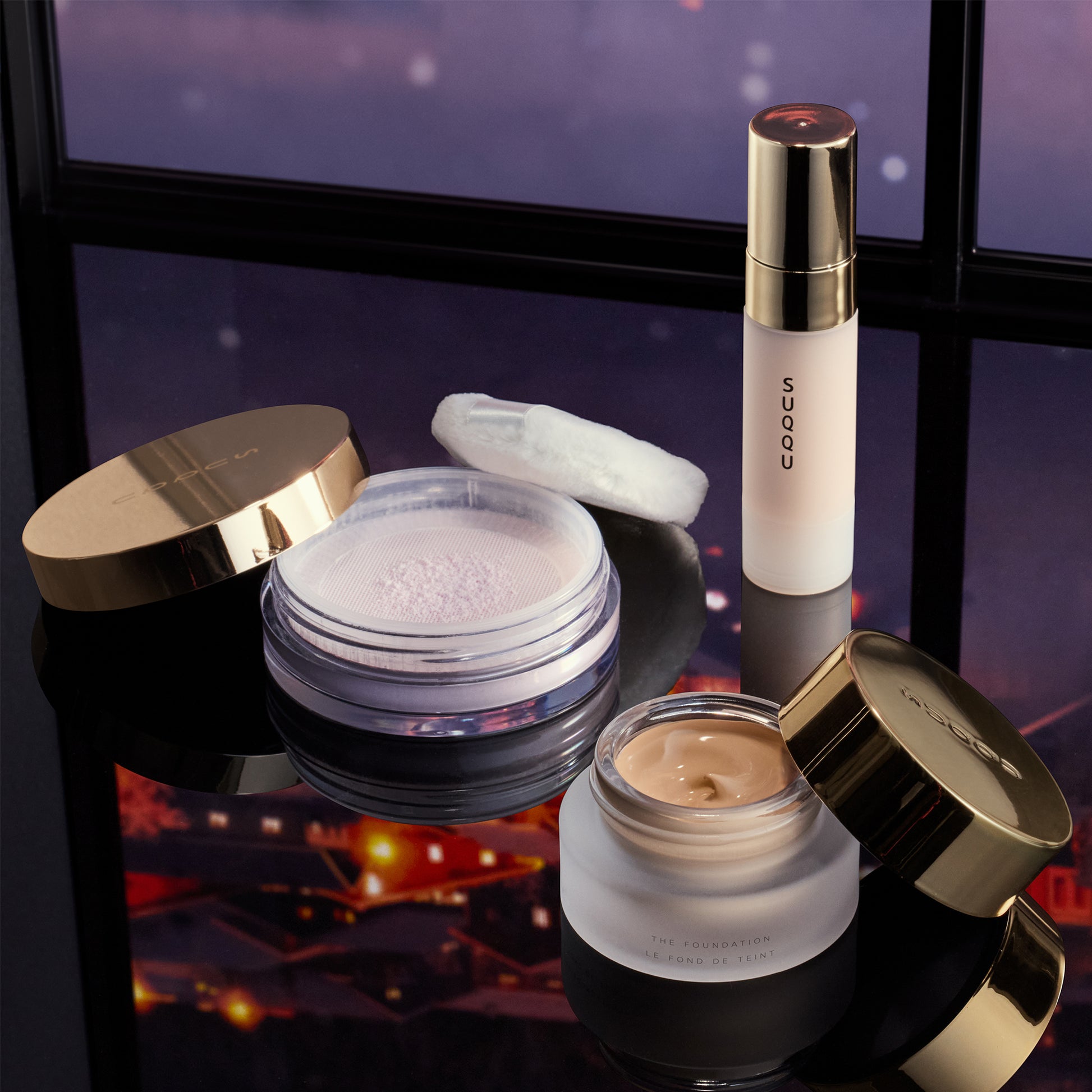 SUQQU The Foundation Starter Kit A various base make up products grouped