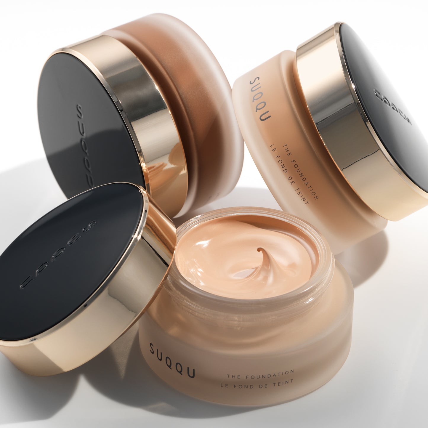 Three SUQQU The Foundation luxury moisturising Japanese cream base make up jars.