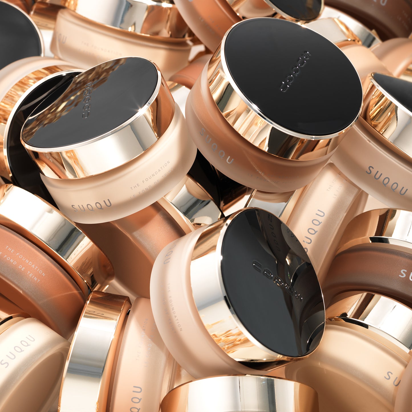 Multiple SUQQU The Foundation luxury moisturising Japanese cream base make up jars.