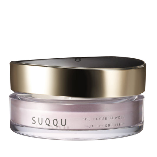 SUQQU The Loose Powder luxury base make up face powder product pot on plain background.