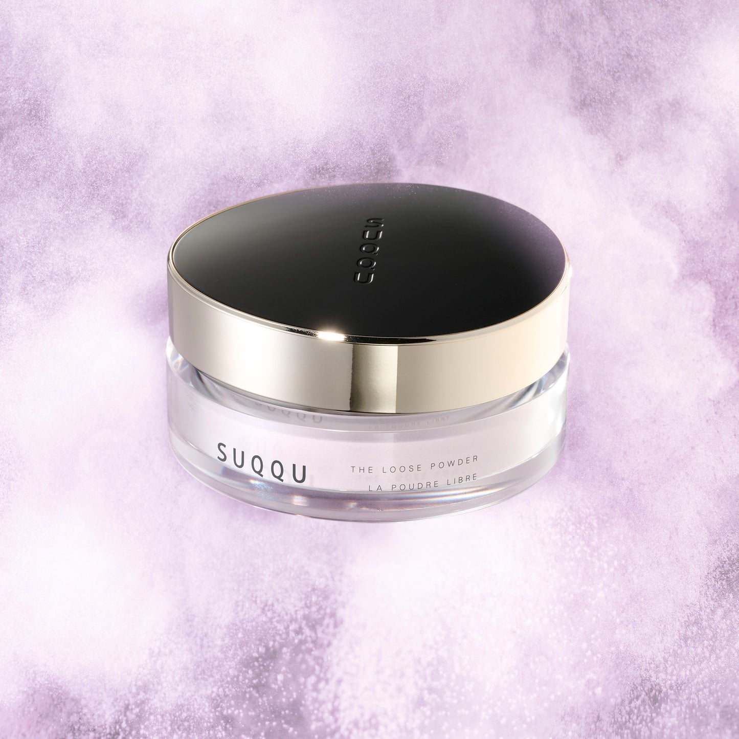 SUQQU The Loose Powder luxury base make up face powder product pot on powder texture background.