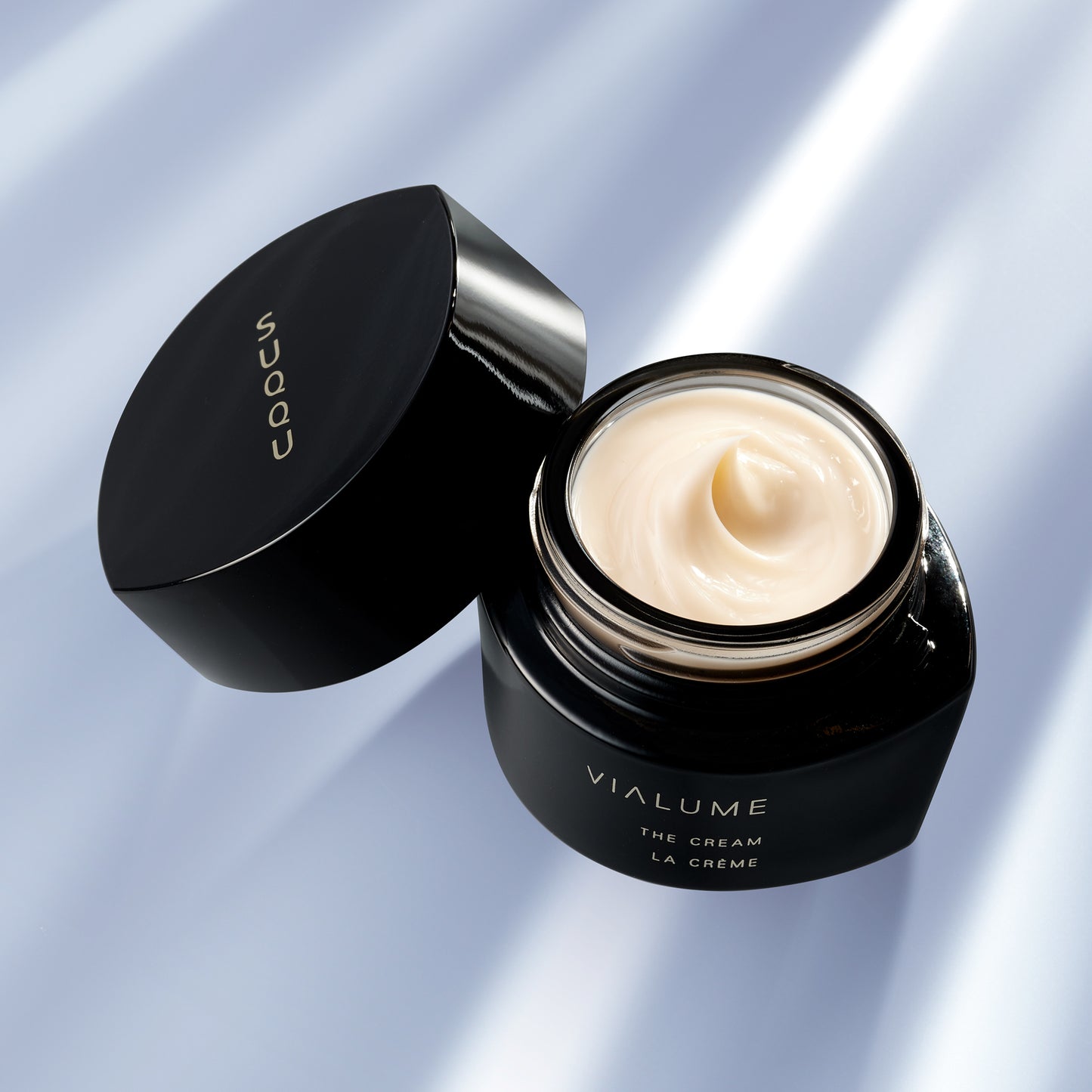 SUQQU Vialume The Cream skincare product with open lid showing cream texture