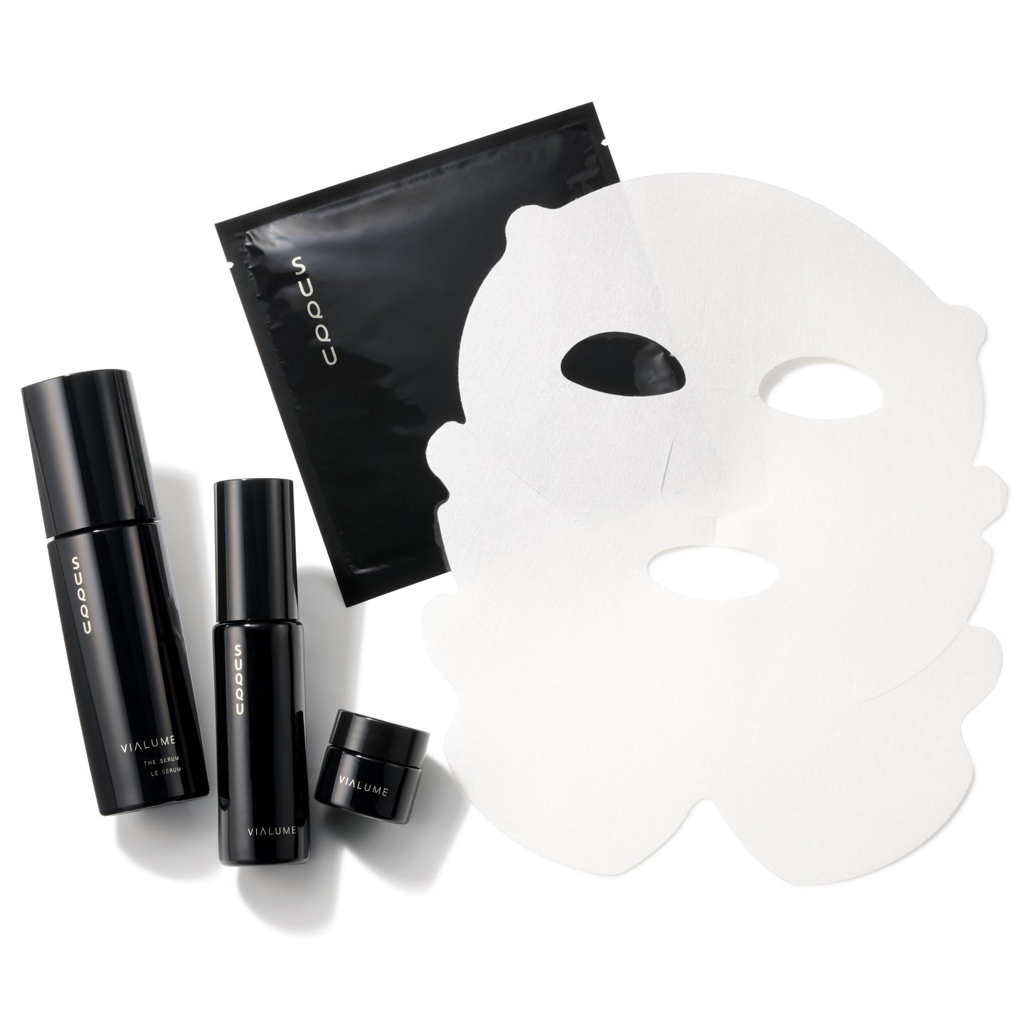 SUQQU Vialume The Kit D skincare products with open sheet mask