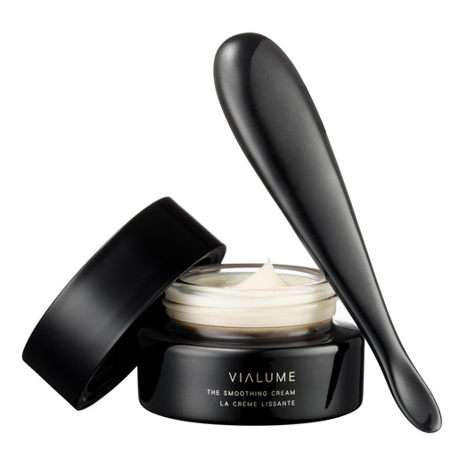 SUQQU Vialume The Smoothing Cream luxury Japanese anti-aging moisturising skincare product pot with ceramic wand.
