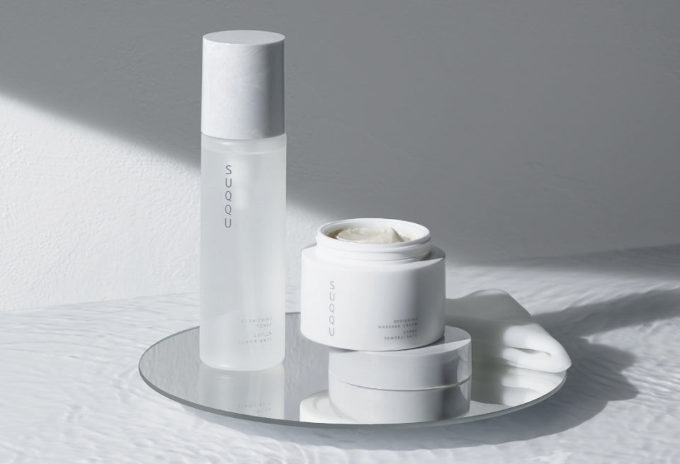 Gankin massage related products, cream and toner displayed together.
