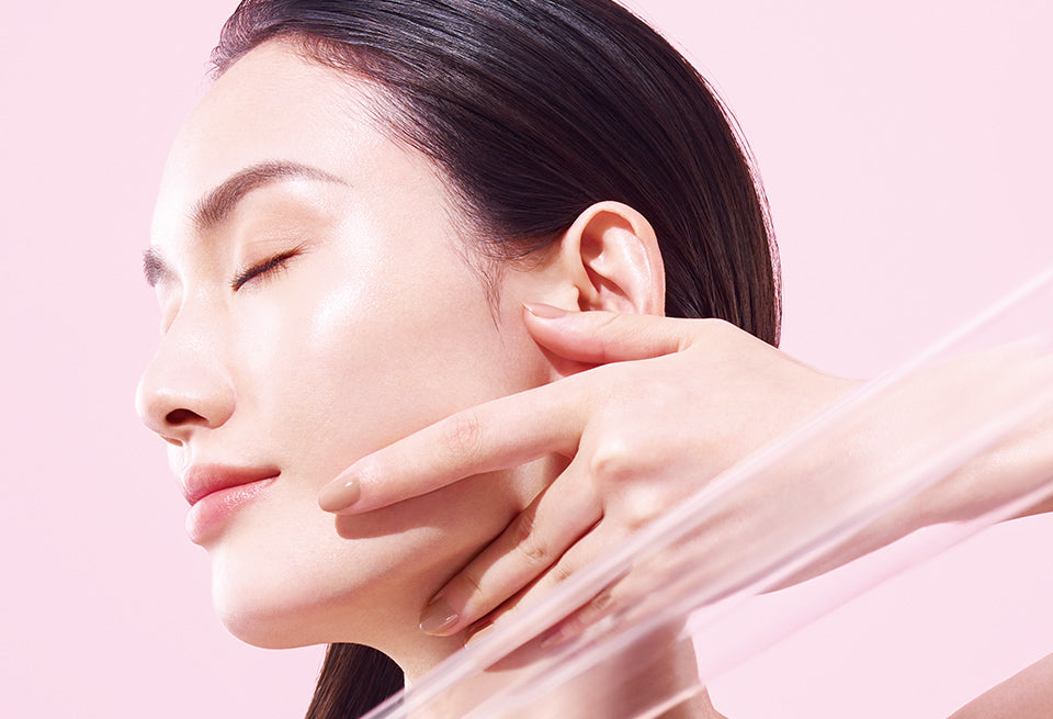 Model performing GANKIN facial massage