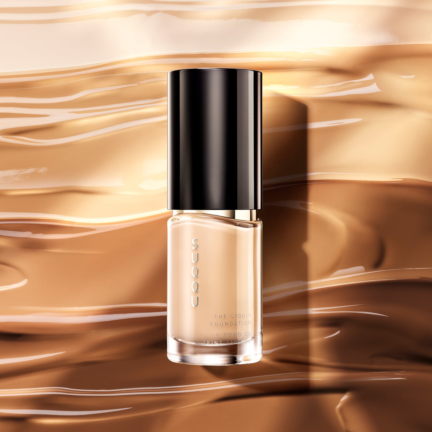 The Liquid Foundation product with liquid texture background