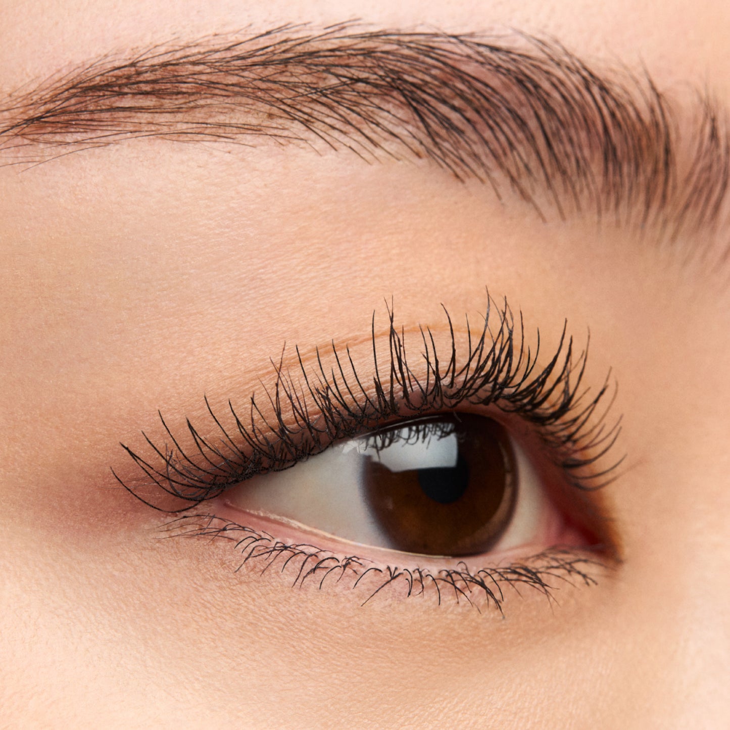 SUQQU 3D Eyelash Mascara Black colour product for longer thicker lashes worn on model eye close up