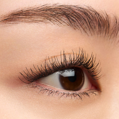 SUQQU 3D Eyelash Mascara Black colour product for longer thicker lashes worn on model eye close up