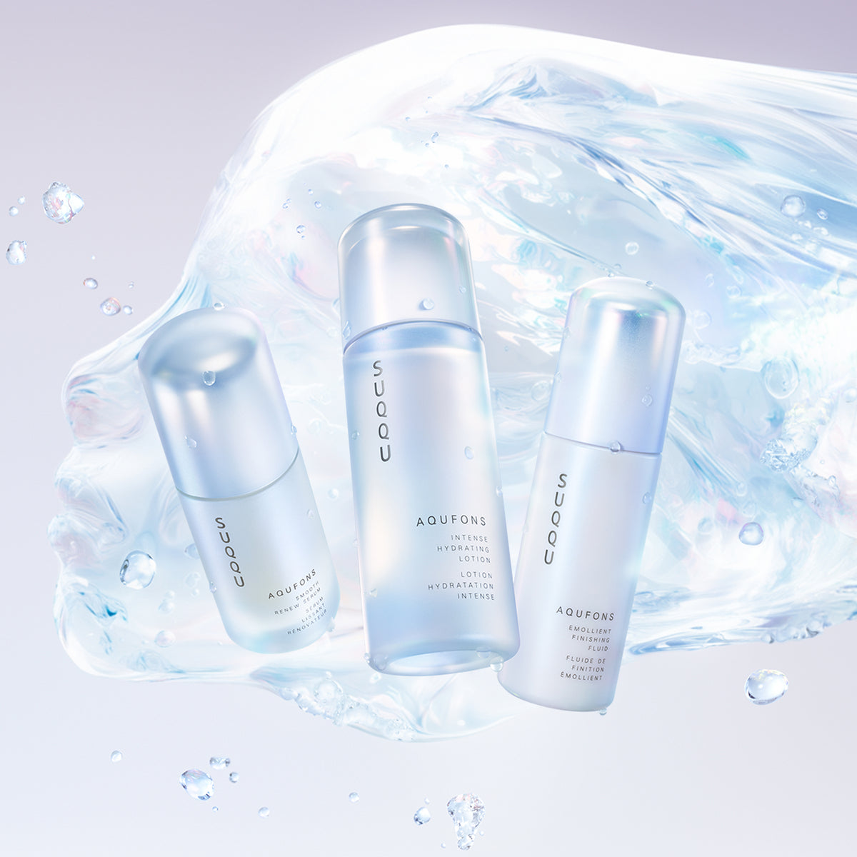 Three SUQQU Aqufons Smooth Renew Serum, Intense Hydrating Lotion and Emollient Finishing Fluid skincare moisturiser pump bottles on abstract face water background.