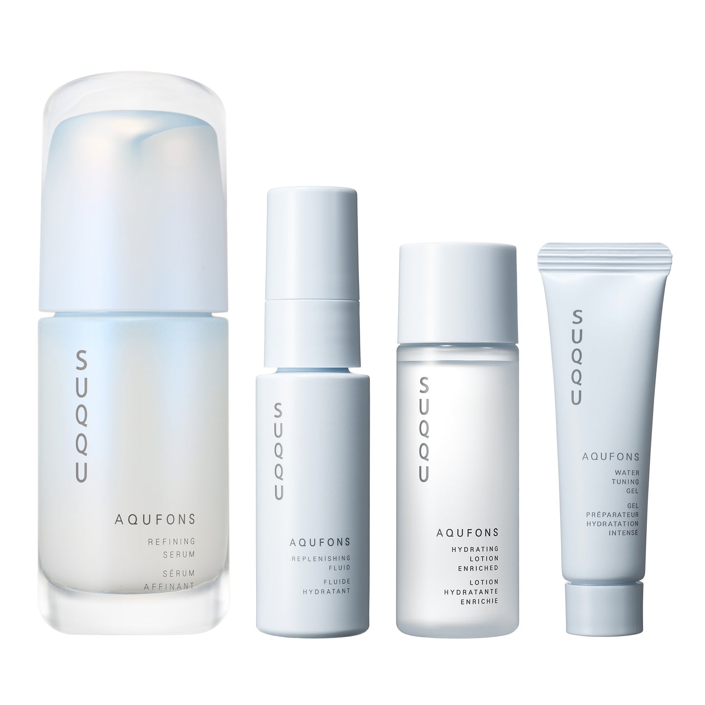 SUQQU Aqufons Refining Serum Kit four luxury Japanese skincare products on a plain background. Serum, lotion, fluid and gel moisturisers.