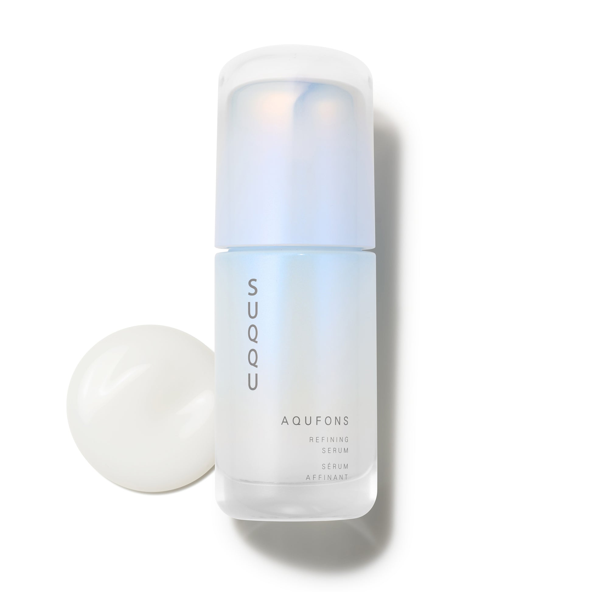 SUQQU Aqufons Refining Serum Kit luxury Japanese skincare product with texture swatch.