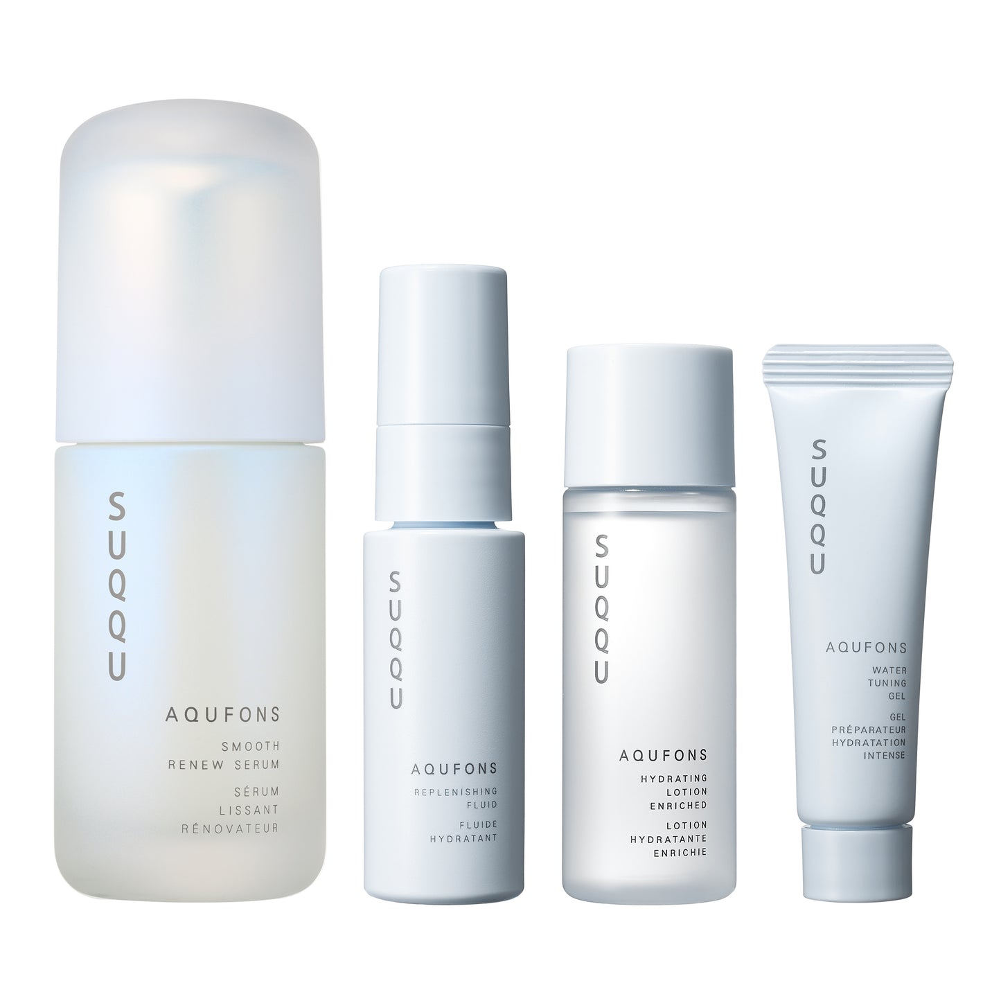 SUQQU Aqufons Smooth Renew Serum Kit four luxury Japanese skincare products on a plain background. Serum, lotion, fluid and gel moisturisers.