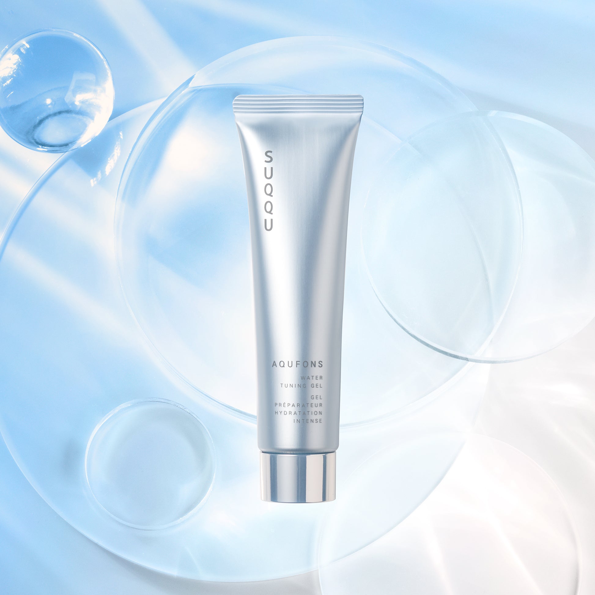 SUQQU Aqufons Water Tuning Gel anti-glycation Japanese skincare moisturising tube product on bubble background.