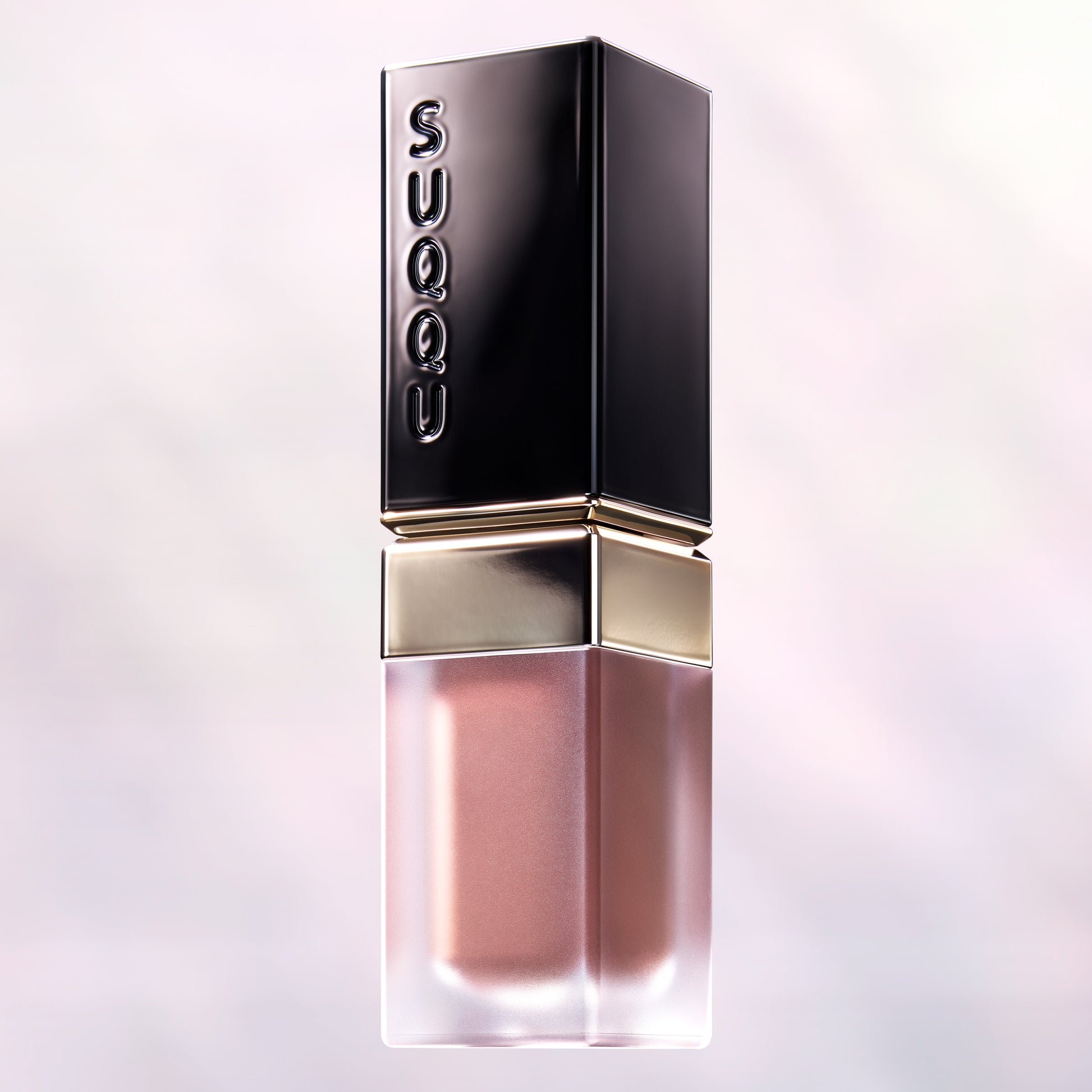 SUQQU Blur Liquid Lip luxury liquid red lipstick product on pearl background