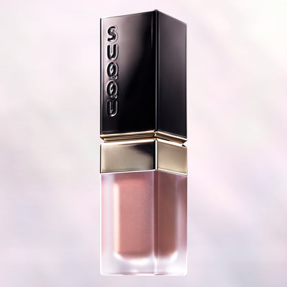 SUQQU Blur Liquid Lip luxury liquid red lipstick product on pearl background