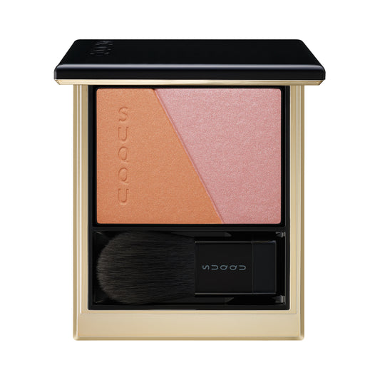 SUQQU Blurring Color Blush 110 orange and pink blush and highlighter palette open on plain background