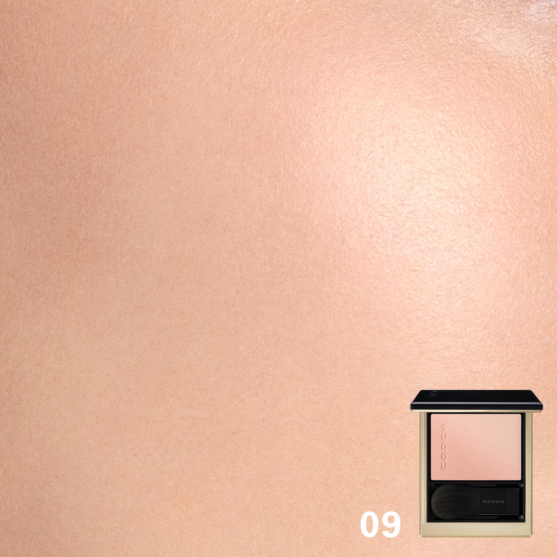 SUQQU Blurring Color Blush 09 cheek blusher and highlighter, soft coral and peach colour swatch worn on close up of model's cheek.