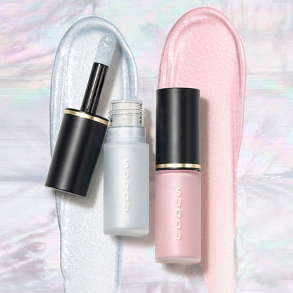 SUQQU Complexion Face Color 06 and 102 liquid highlighter blushers with applicator wand. Displayed on soft shimmering pink and blue pearlescent texture swatch background.