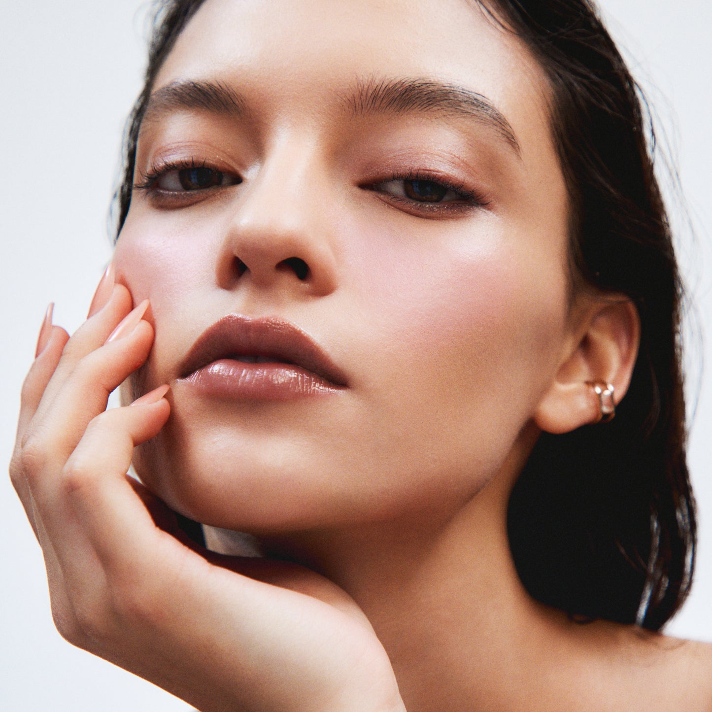 Model portrait wearing SUQQU Complexion Face Color