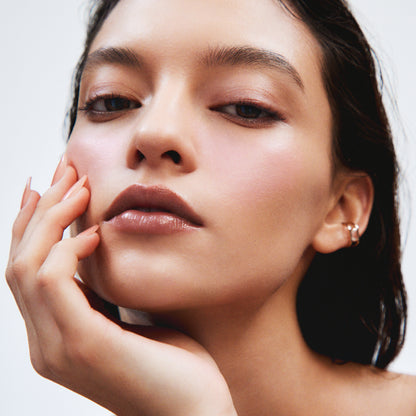 Model portrait wearing SUQQU Complexion Face Color