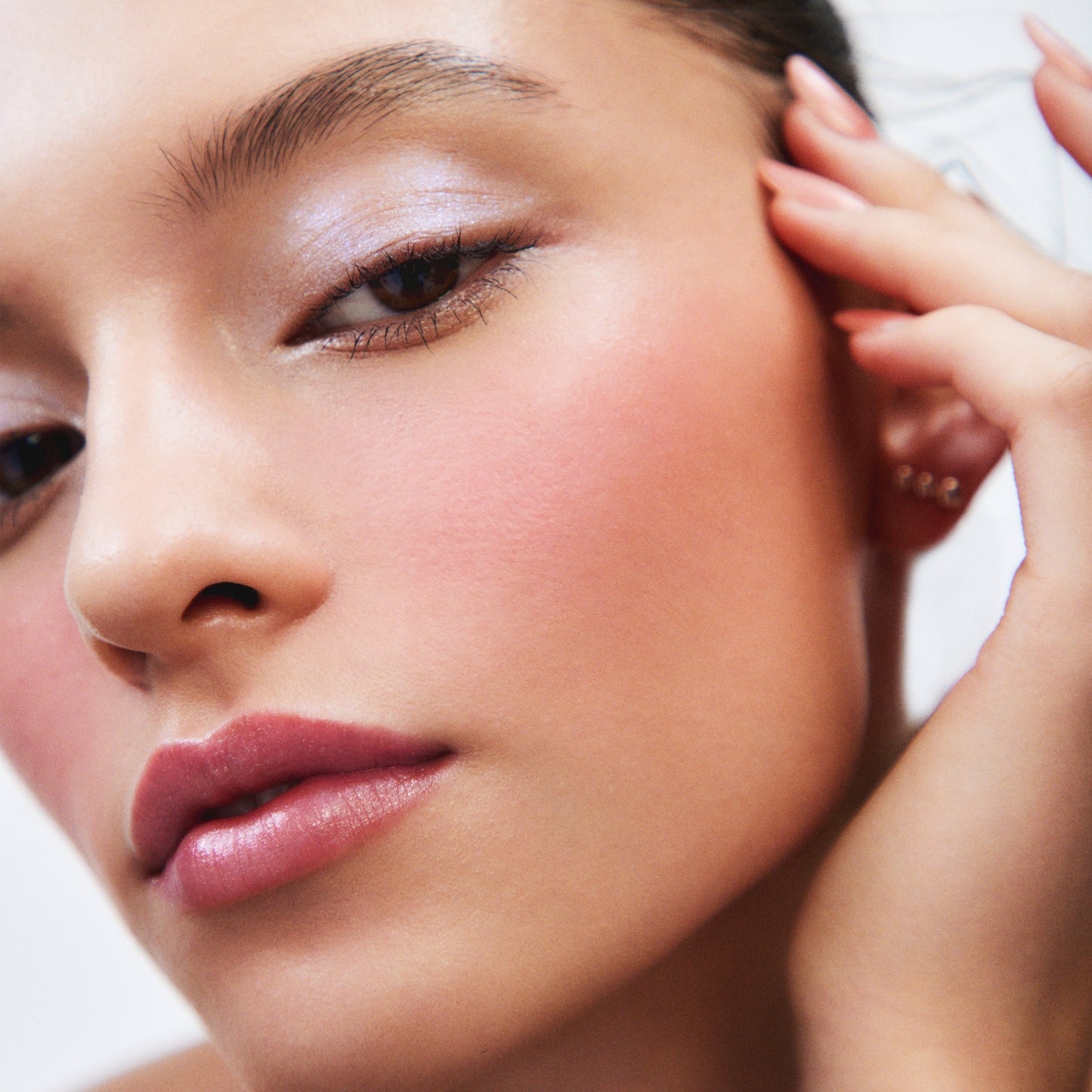 Model portrait wearing SUQQU Complexion Face Color