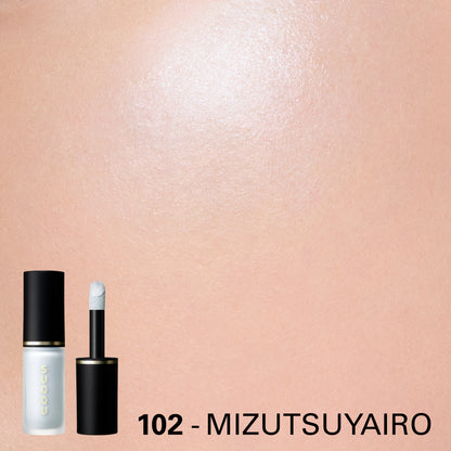 SUQQU Complexion Face Color 102 Mizutsuyairo liquid highlighter blusher shown on model cheek close up. Shimmering soft blue pearl colour.