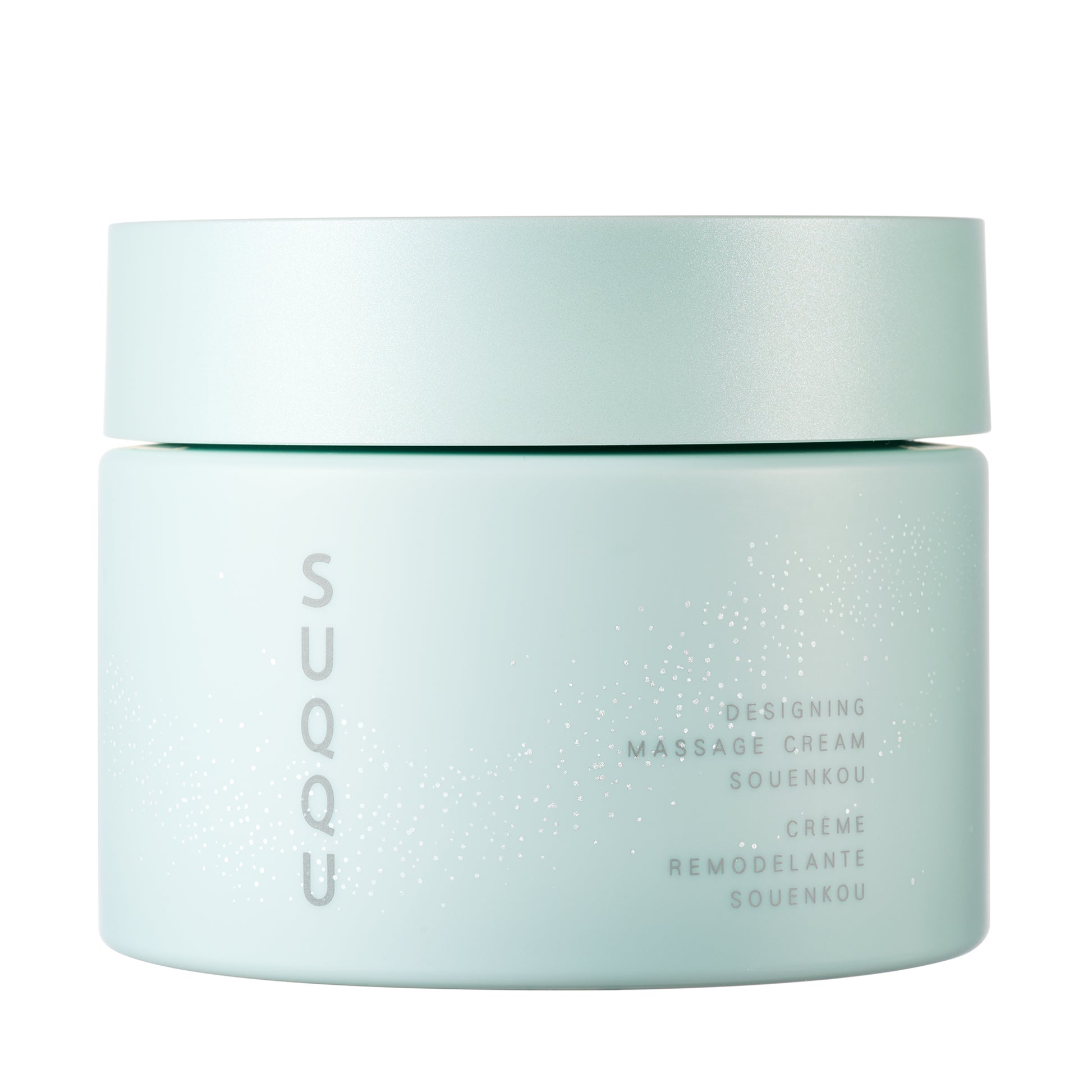 SUQQU Designing Massage Cream Kit Souenkou. Massage cream pot on plain background.