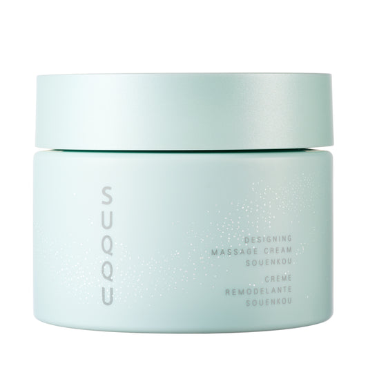 SUQQU Designing Massage Cream Kit Souenkou. Massage cream pot on plain background.