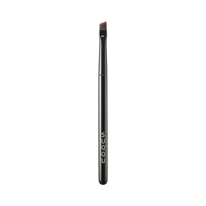 SUQQU Eyebrow Brush Small Japanese synthetic artisan professional grade make up brush on plain background.
