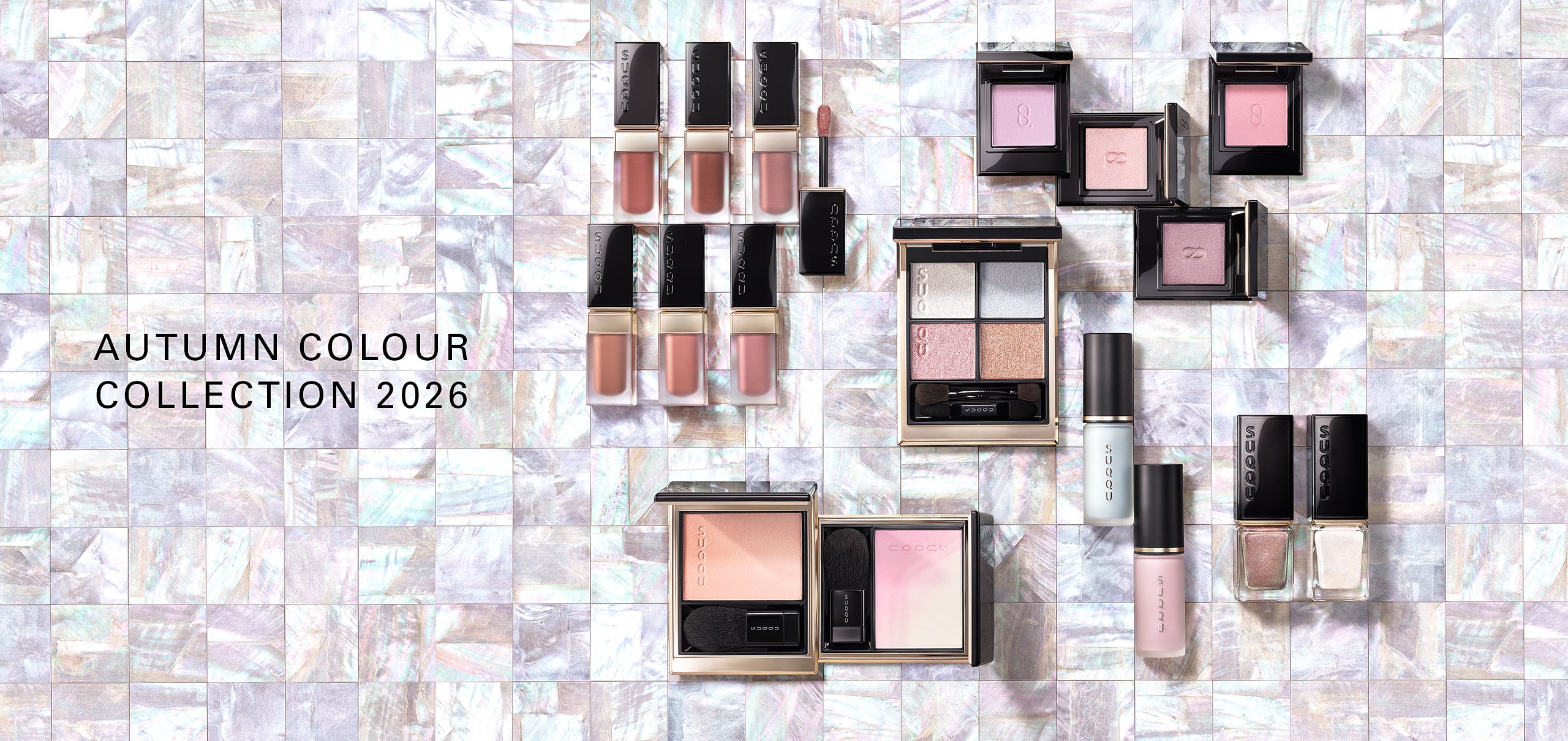 SUQQU Autumn Colour Collection 2026. 'Raden' themed multiple pearl toned colour makeup up products open on shell tiles. 6 Luxury liquid lipsticks, 5 eyeshadows, 4 cheek blushers and 2 nail polishes.