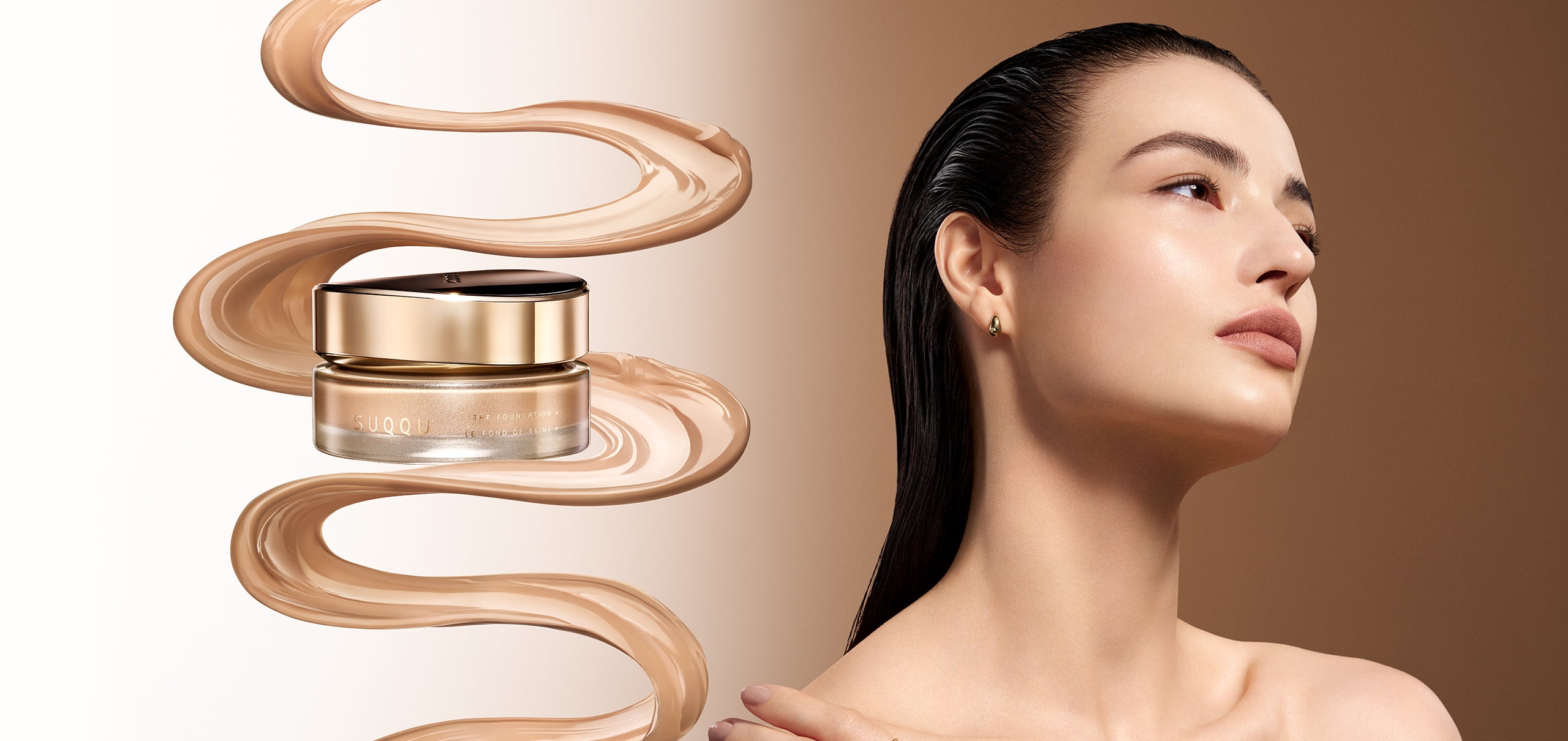 A SUQQU The Foundation e jar with a gold cap and beige foundation cream swirls on a warm beige background, alongside a close-up of a woman's radiant and flawless face complexion.