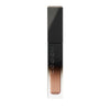 SUQQU Liquid Luster Eyes 06 shimmer dusty coral eyeshadow product on plain background.