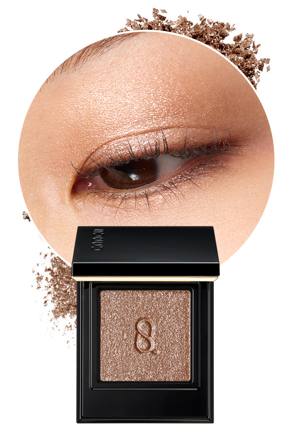 Mono Look Eyes L-03 the best single colour eyeshadow range from SUQQU. A beautiful eyeshadow palette in sparkling brown glitter colour is shown with model eye wear closeup and swatch colour, displaying the creamy seamless finish and luxury texture.