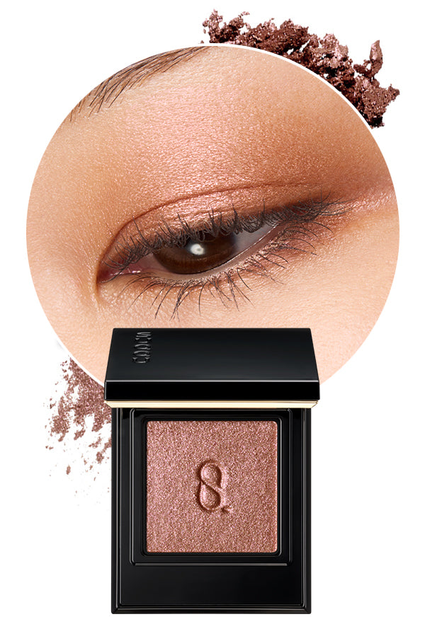 Mono Look Eyes P-01 the best single colour eyeshadow range from SUQQU. A beautiful colour shifting eyeshadow palette in prismatic pink and brown colour is shown with model eye wear closeup and swatch colour, displaying the creamy seamless finish and luxury texture.