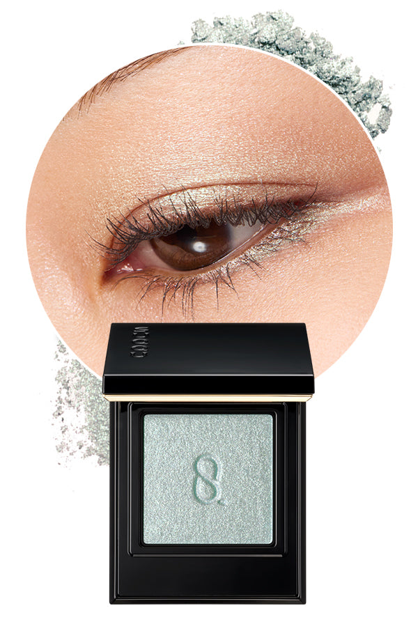 Mono Look Eyes P-04 the best single colour eyeshadow range from SUQQU. A beautiful colour shifting eyeshadow palette in prismatic light blue and green colour is shown with model eye wear closeup and swatch colour, displaying the creamy seamless finish and luxury texture.
