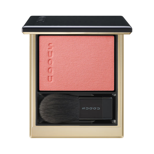 SUQQU Melting Powder Blush 103 deep coral make up product palette open on plain background.
